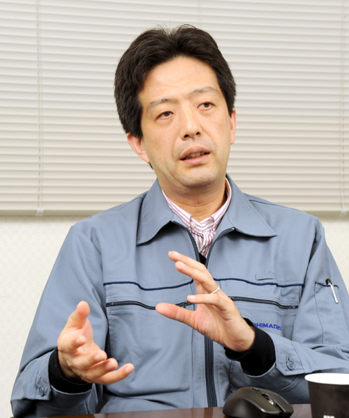 梅田充